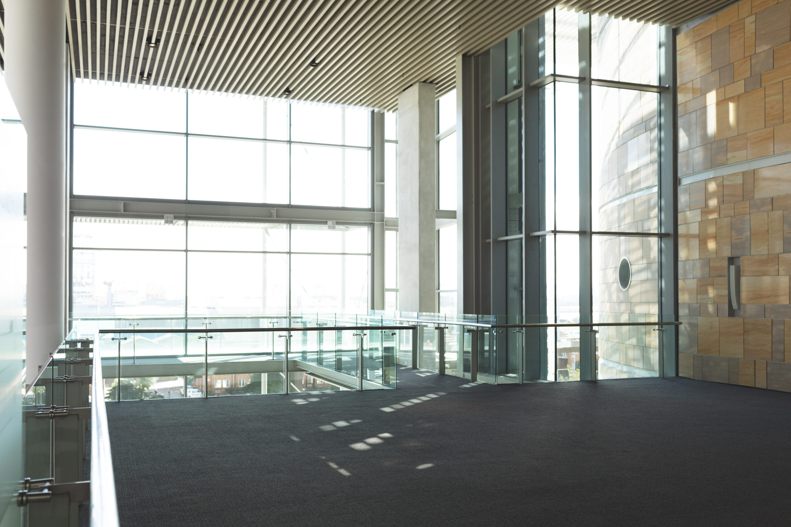 Spacious lobby area with walls painted by Victory Paints & Services Inc.