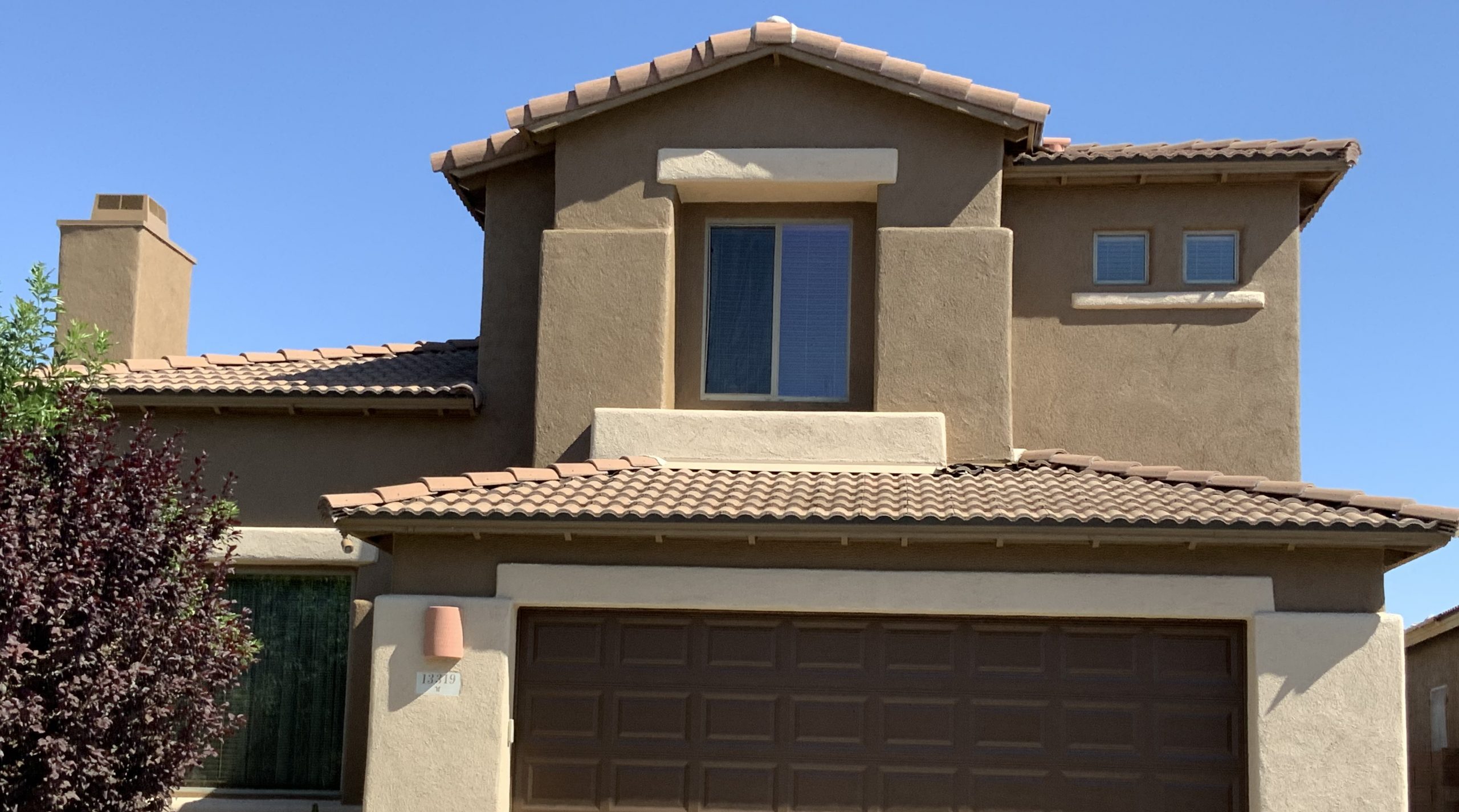 Freshly painted home exterior by a provider of exterior painting services.