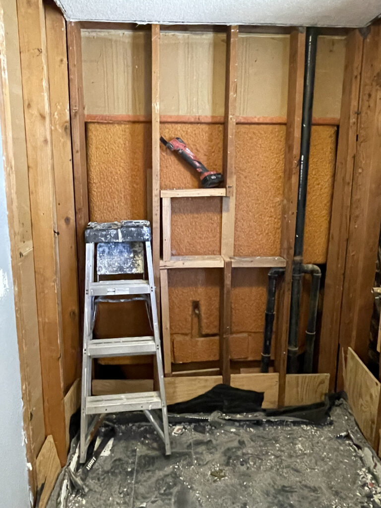 A bathroom under renovation, ready for interior painting services in Riverside, CA.